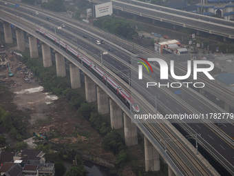 The Jakarta-Bandung high-speed train, also known as Whoosh, is seen crossing Bekasi, West Java, on Saturday, November 16, 2024. Deputy Minis...