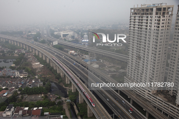 The Jakarta-Bandung high-speed train, also known as Whoosh, is seen crossing Bekasi, West Java, on Saturday, November 16, 2024. Deputy Minis...