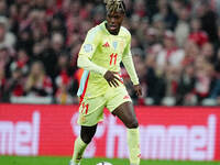 Nico Williams of Spain  controls the ball during the Nations League Round 5 match between Denmark against Spain at Parken, Copenhagen, Denma...