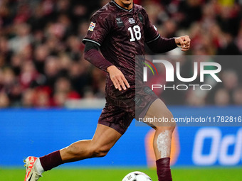 Alexander Bah of Denmark  controls the ball during the Nations League Round 5 match between Denmark against Spain at Parken, Copenhagen, Den...