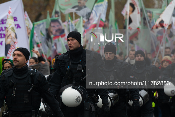 Police are present at the demonstration site as thousands of Kurds demonstrate for the release of Kurdish Leader Abdullah Ocalan in Cologne,...