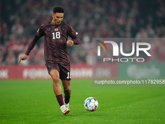 Alexander Bah of Denmark  controls the ball during the Nations League Round 5 match between Denmark against Spain at Parken, Copenhagen, Den...