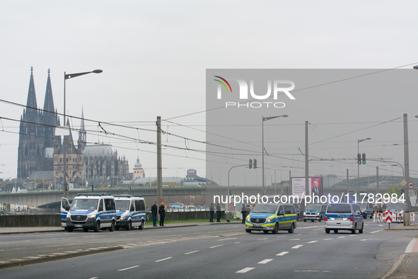 Police are present at the demonstration site as thousands of Kurds demonstrate for the release of Kurdish Leader Abdullah Ocalan in Cologne,...