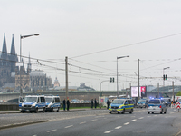 Police are present at the demonstration site as thousands of Kurds demonstrate for the release of Kurdish Leader Abdullah Ocalan in Cologne,...