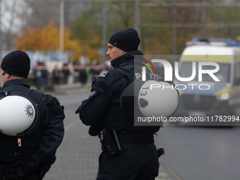 Police are present at the demonstration site as thousands of Kurds demonstrate for the release of Kurdish Leader Abdullah Ocalan in Cologne,...