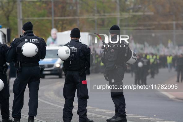 Police are present at the demonstration site as thousands of Kurds demonstrate for the release of Kurdish Leader Abdullah Ocalan in Cologne,...