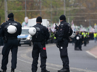 Police are present at the demonstration site as thousands of Kurds demonstrate for the release of Kurdish Leader Abdullah Ocalan in Cologne,...