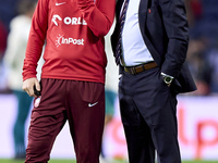 Michal Probierz, Head Coach of Poland, talks with a staff member prior to the UEFA Nations League 2024/25 League A Group A1 match between Po...