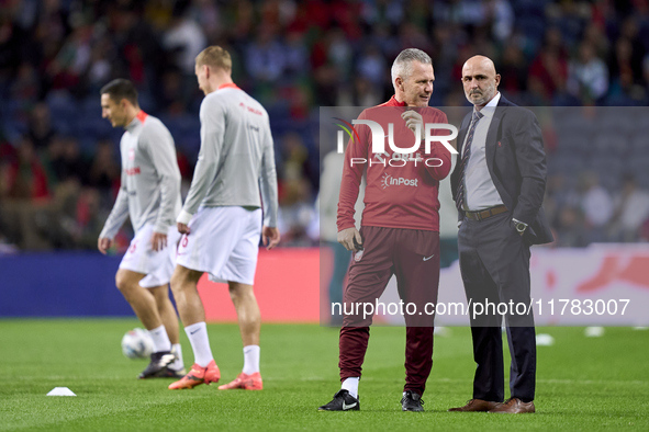 Michal Probierz, Head Coach of Poland, talks with a staff member prior to the UEFA Nations League 2024/25 League A Group A1 match between Po...