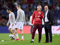 Michal Probierz, Head Coach of Poland, talks with a staff member prior to the UEFA Nations League 2024/25 League A Group A1 match between Po...