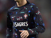 Cristiano Ronaldo of Portugal warms up before the UEFA Nations League 2024/25 League A Group A1 match between Portugal and Poland at Estadio...