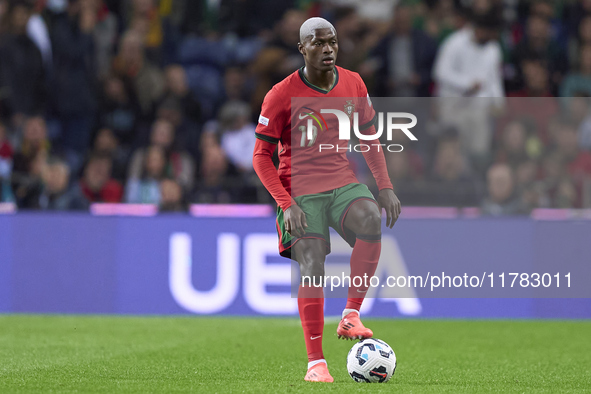 Nuno Mendes of Portugal plays during the UEFA Nations League 2024/25 League A Group A1 match between Portugal and Poland at Estadio Do Draga...