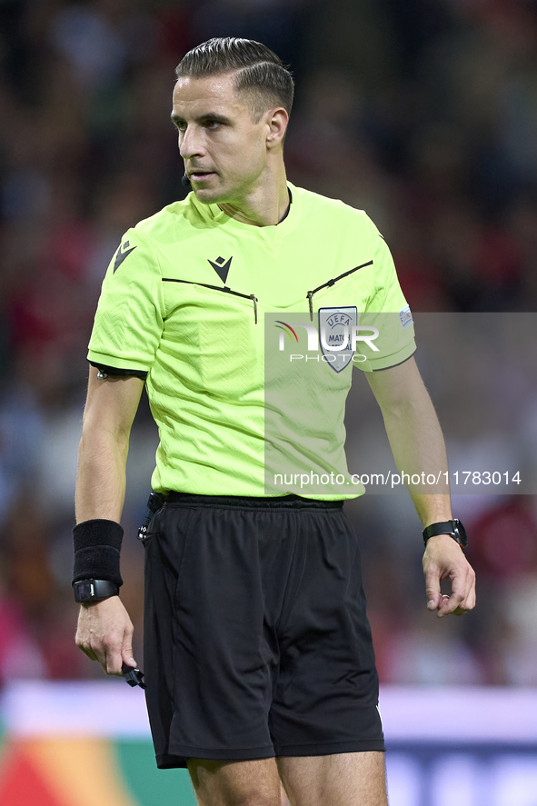 Referee Donatas Rumsas reacts during the UEFA Nations League 2024/25 League A Group A1 match between Portugal and Poland at Estadio Do Draga...