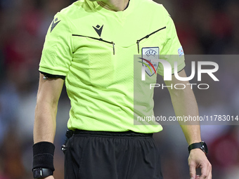 Referee Donatas Rumsas reacts during the UEFA Nations League 2024/25 League A Group A1 match between Portugal and Poland at Estadio Do Draga...