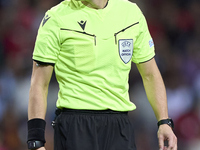 Referee Donatas Rumsas reacts during the UEFA Nations League 2024/25 League A Group A1 match between Portugal and Poland at Estadio Do Draga...