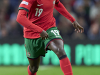 Nuno Mendes of Portugal plays during the UEFA Nations League 2024/25 League A Group A1 match between Portugal and Poland at Estadio Do Draga...