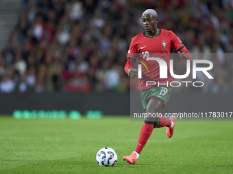 Nuno Mendes of Portugal plays during the UEFA Nations League 2024/25 League A Group A1 match between Portugal and Poland at Estadio Do Draga...