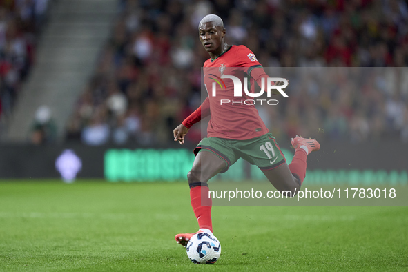 Nuno Mendes of Portugal plays during the UEFA Nations League 2024/25 League A Group A1 match between Portugal and Poland at Estadio Do Draga...