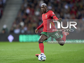 Nuno Mendes of Portugal plays during the UEFA Nations League 2024/25 League A Group A1 match between Portugal and Poland at Estadio Do Draga...