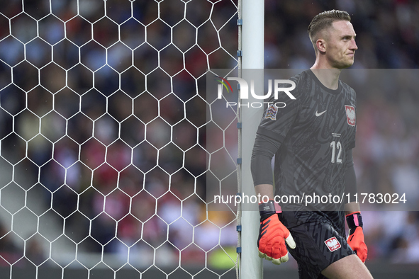 Marcin Bulka of Poland reacts during the UEFA Nations League 2024/25 League A Group A1 match between Portugal and Poland at Estadio Do Draga...