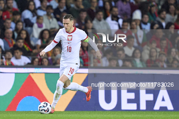 Piotr Zielinski of Poland is in action during the UEFA Nations League 2024/25 League A Group A1 match between Portugal and Poland at Estadio...