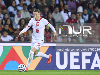 Piotr Zielinski of Poland is in action during the UEFA Nations League 2024/25 League A Group A1 match between Portugal and Poland at Estadio...