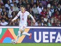 Piotr Zielinski of Poland is in action during the UEFA Nations League 2024/25 League A Group A1 match between Portugal and Poland at Estadio...