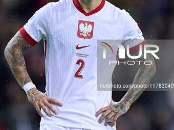 Kamil Piatkowski of Poland reacts during the UEFA Nations League 2024/25 League A Group A1 match between Portugal and Poland at Estadio Do D...