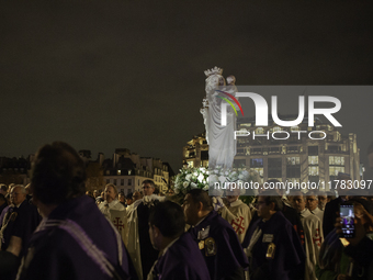 The procession of the Virgin Mary statue took place in Paris, France, on November 15, 2024. The return of the Virgin and Child starts with a...