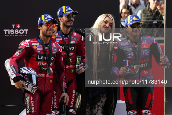 Enea Bastianini (23) of Italy and Ducati Lenovo Team, Francesco Pecco Bagnaia (1) of Italy and Ducati Lenovo Team, spanish singer Lola Ingim...