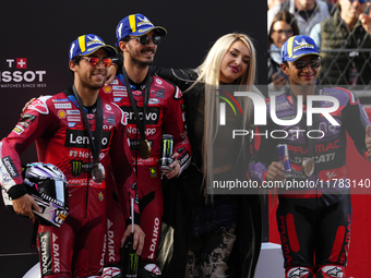 Enea Bastianini (23) of Italy and Ducati Lenovo Team, Francesco Pecco Bagnaia (1) of Italy and Ducati Lenovo Team, spanish singer Lola Ingim...