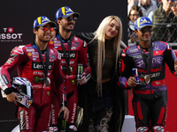 Enea Bastianini (23) of Italy and Ducati Lenovo Team, Francesco Pecco Bagnaia (1) of Italy and Ducati Lenovo Team, spanish singer Lola Ingim...