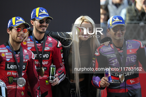 Enea Bastianini (23) of Italy and Ducati Lenovo Team, Francesco Pecco Bagnaia (1) of Italy and Ducati Lenovo Team, spanish singer Lola Ingim...