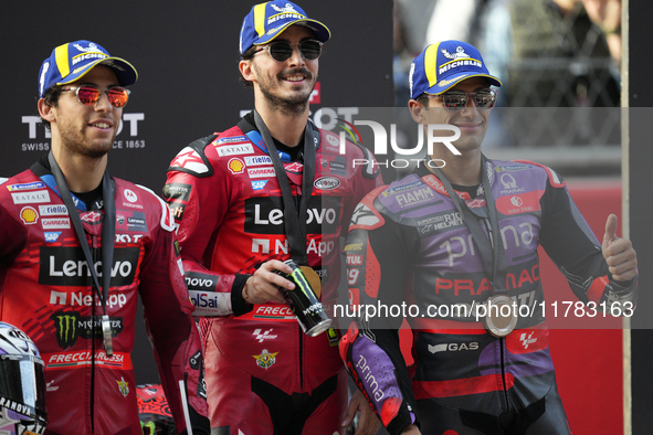 Enea Bastianini (23) of Italy and Ducati Lenovo Team, Francesco Pecco Bagnaia (1) of Italy and Ducati Lenovo Team, and Jorge Martin (89) of...