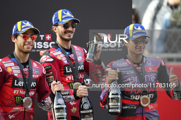 Enea Bastianini (23) of Italy and Ducati Lenovo Team, Francesco Pecco Bagnaia (1) of Italy and Ducati Lenovo Team, and Jorge Martin (89) of...