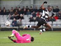 True Grant of Buxton stops a shot from Cedric Main of Darlington during the Isuzu FA Trophy Second round match between Darlington and Buxton...