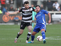 Diego De Girolamo of Buxton is tackled by Toby Lees of Darlington during the Isuzu FA Trophy Second round match between Darlington and Buxto...