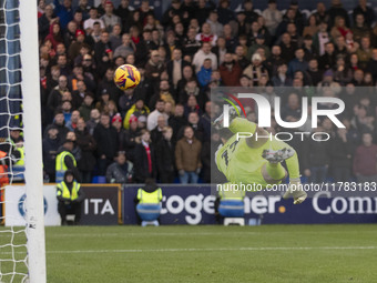 Callum Burton #13 (GK) of Wrexham A.F.C. concedes a goal during the Sky Bet League 1 match between Stockport County and Wrexham at the Edgel...