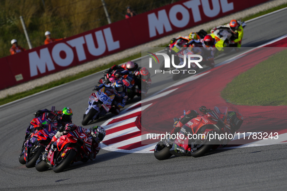 Francesco Pecco Bagnaia (1) of Italy and Ducati Lenovo Team, Enea Bastianini (23) of Italy and Ducati Lenovo Team during the sprint of the M...