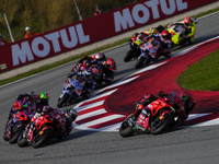 Francesco Pecco Bagnaia (1) of Italy and Ducati Lenovo Team, Enea Bastianini (23) of Italy and Ducati Lenovo Team during the sprint of the M...