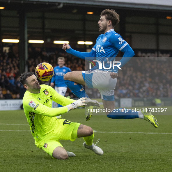 Callum Burton #13 (GK) of Wrexham A.F.C. makes a save during the Sky Bet League 1 match between Stockport County and Wrexham at the Edgeley...