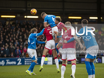 Fraser Horsfall #6 of Stockport County F.C. heads the ball at goal during the Sky Bet League 1 match between Stockport County and Wrexham at...