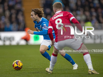 Lewis Bate #4 of Stockport County F.C. is in possession of the ball during the Sky Bet League 1 match between Stockport County and Wrexham a...