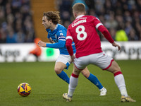 Lewis Bate #4 of Stockport County F.C. is in possession of the ball during the Sky Bet League 1 match between Stockport County and Wrexham a...