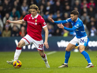 Jon Daoi Boovarsson, number 28 of Wrexham A.F.C., is in possession of the ball during the Sky Bet League 1 match between Stockport County an...