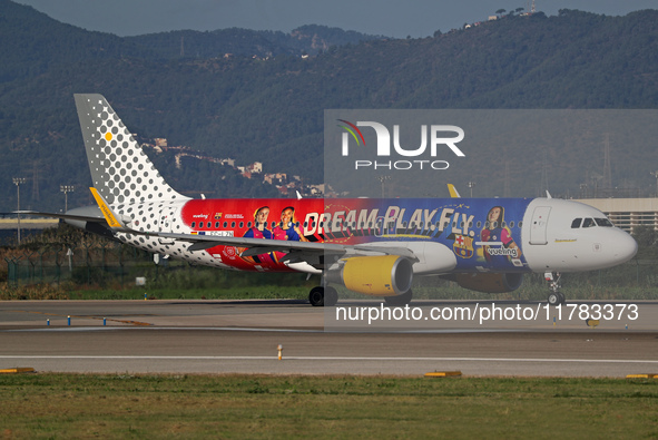 The FC Barcelona women's team launches the Vueling Airbus 320-214 to travel to Madrid with the new livery, featuring images of Aitana Bonmat...