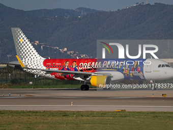 The FC Barcelona women's team launches the Vueling Airbus 320-214 to travel to Madrid with the new livery, featuring images of Aitana Bonmat...