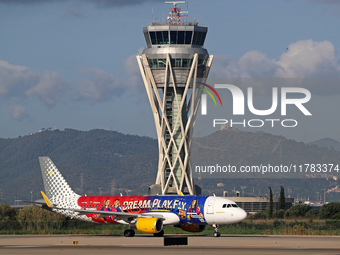 The FC Barcelona women's team launches the Vueling Airbus 320-214 to travel to Madrid with the new livery, featuring images of Aitana Bonmat...