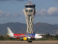 The FC Barcelona women's team launches the Vueling Airbus 320-214 to travel to Madrid with the new livery, featuring images of Aitana Bonmat...