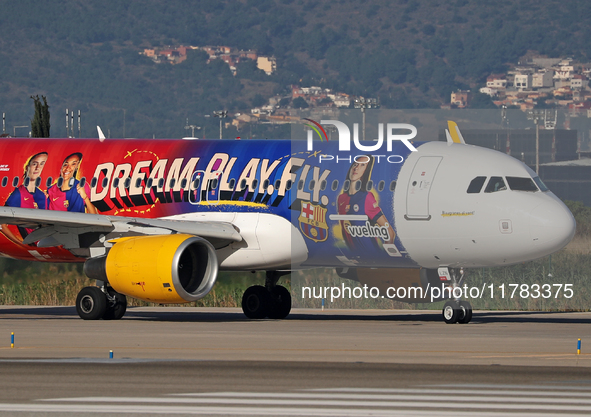 The FC Barcelona women's team launches the Vueling Airbus 320-214 to travel to Madrid with the new livery, featuring images of Aitana Bonmat...